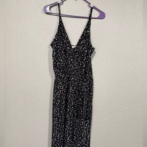 Kaileigh Jumpsuit with pockets, tie around waist. Black with cream detail